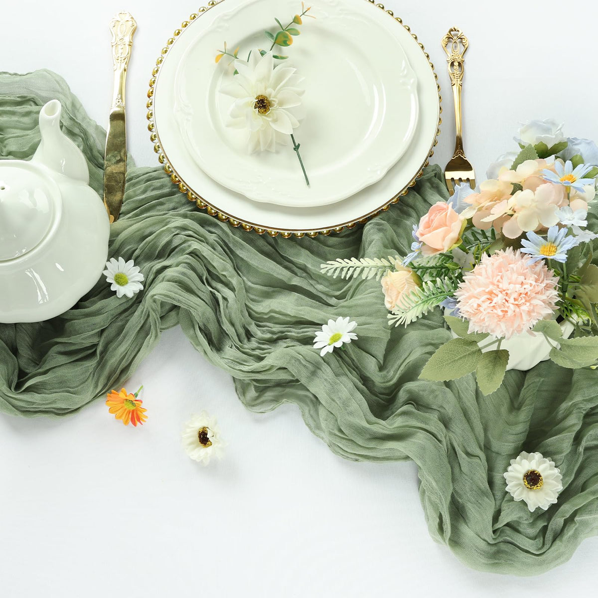 Boho decor scene with RestfulGlow sage-green table drape for chic backdrops.