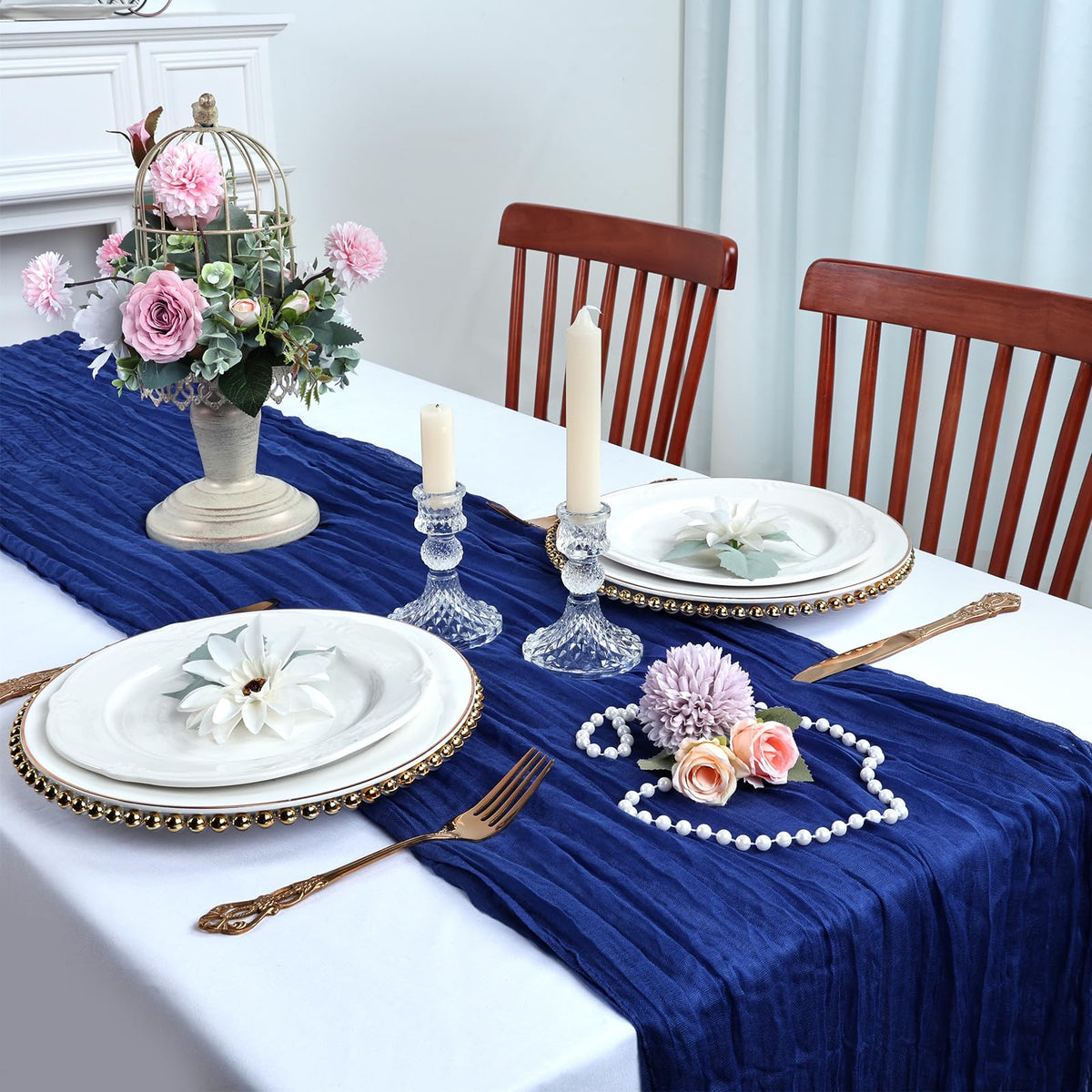 RestfulGlow cheesecloth runner as chair sash accent during celebrations.