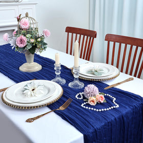 RestfulGlow cheesecloth runner as chair sash accent during celebrations.