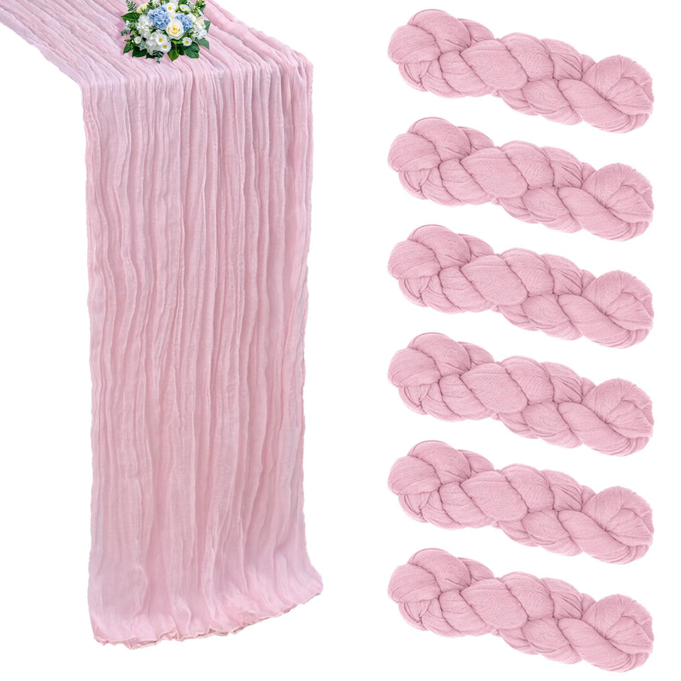 RestfulGlow pink cheesecloth table runner draped on a wedding table for romantic texture.