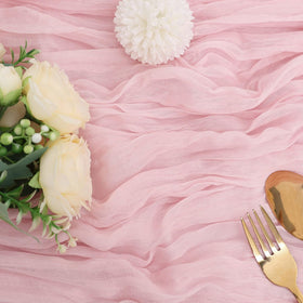 RestfulGlow pink cheesecloth table runner close-up showing crinkled sheer fabric