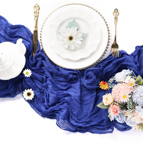 RestfulGlow royal blue cheesecloth runner used as backdrop drape for events.