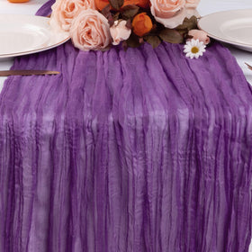 RestfulGlow wedding backdrop with purple table runner for romantic ambiance