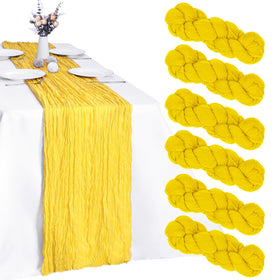 RestfulGlow yellow cheesecloth table runner 10ft pack laid out for a festive wedding or party setup