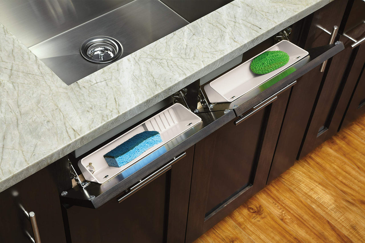 Rev-A-Shelf tip-out trays accessory tray image emphasizes ring holder and soap dish functionality.