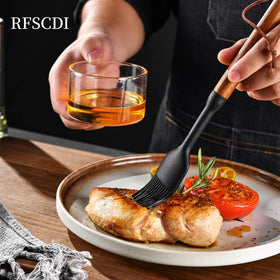 RFSCDI slotted turner silicone spatula for gentle flipping.