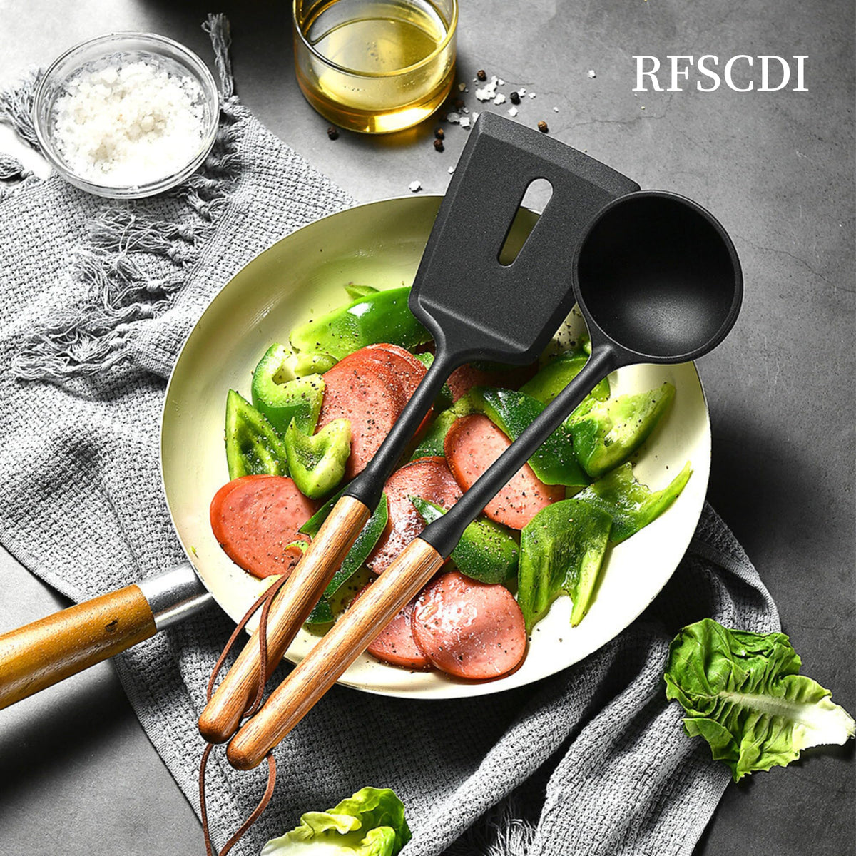RFSCDI stir-fry silicone spatula in black, heat resistant and easy to clean.