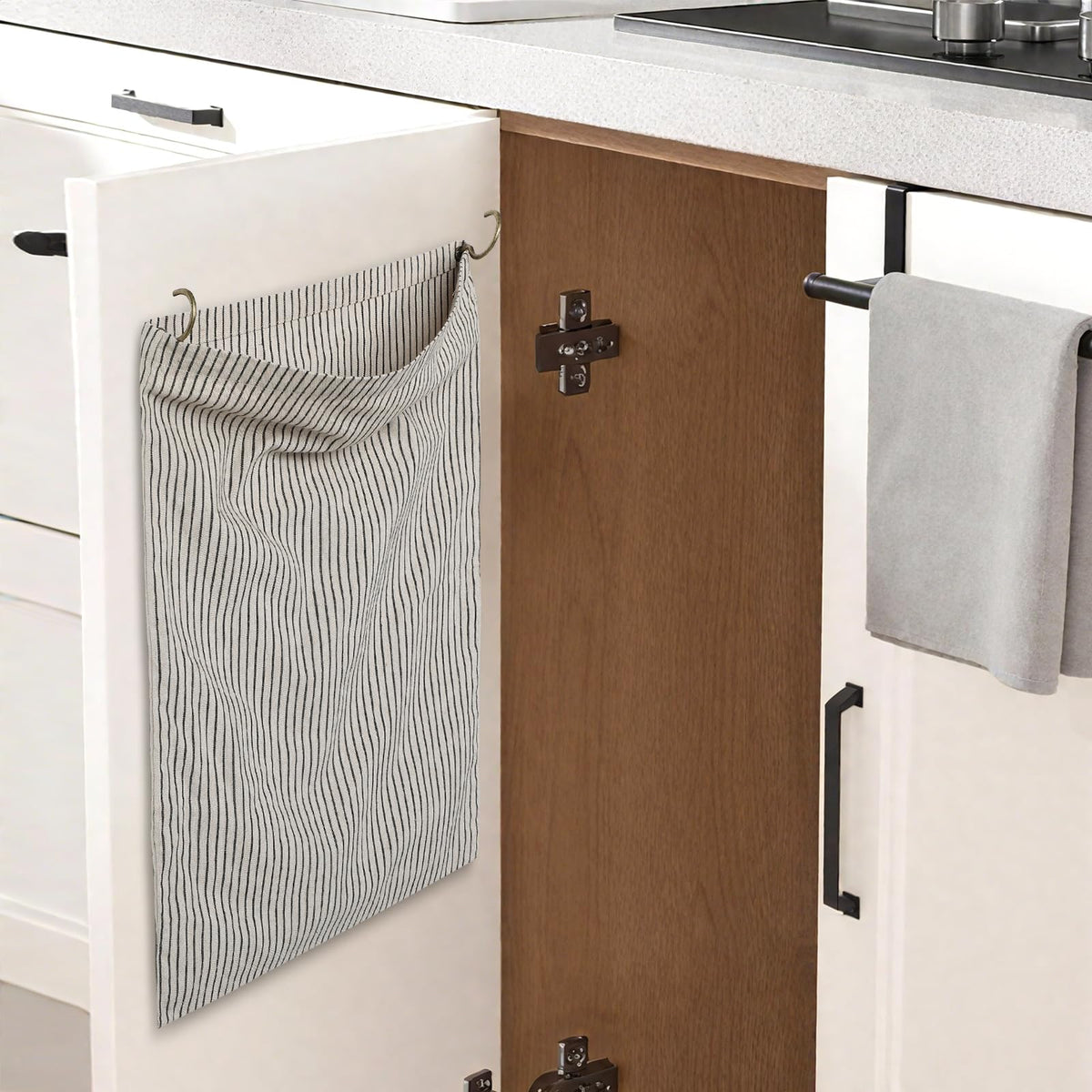 Ribbonlic bag rag cloth holder mounted behind a cabinet door for clutter-free storage.