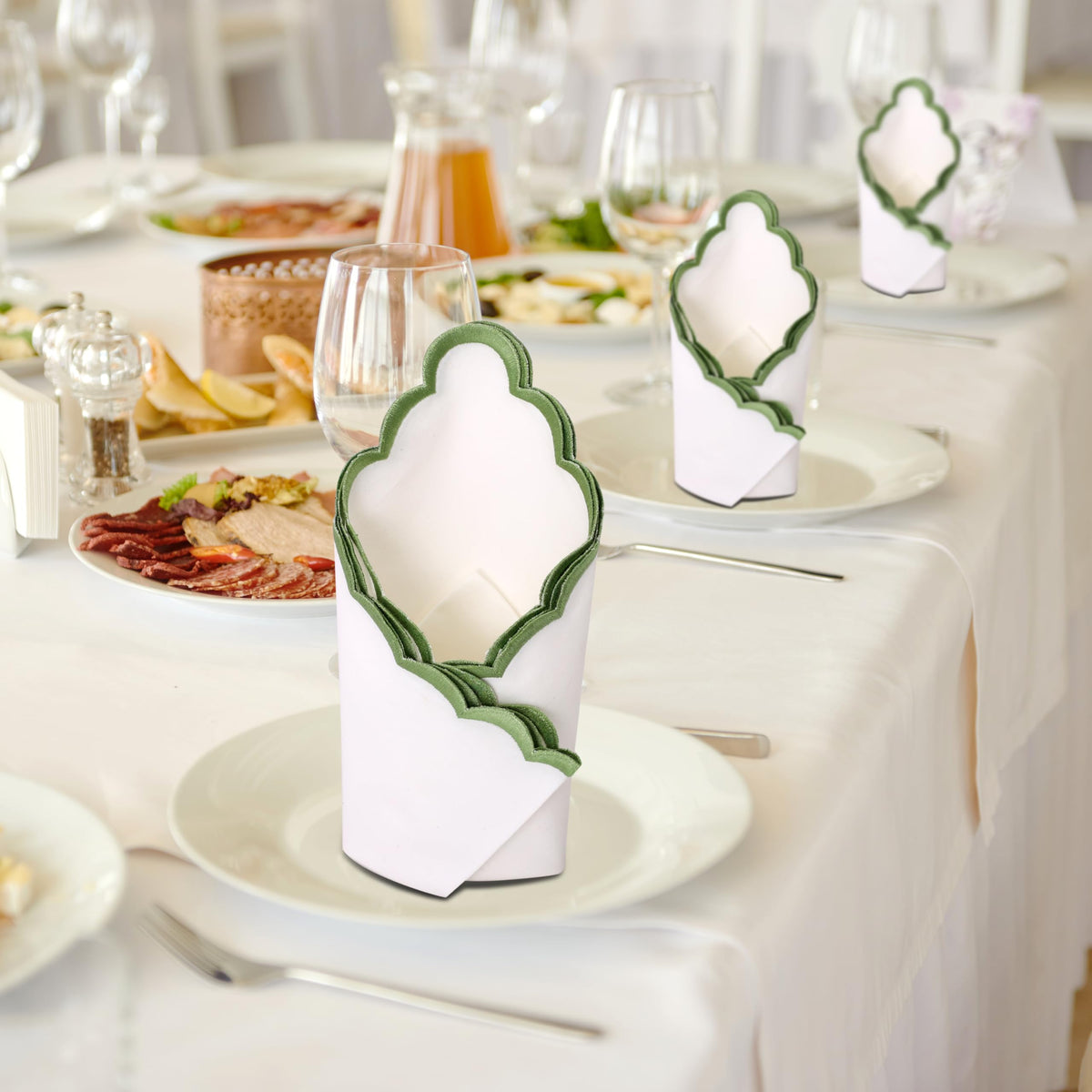 Ridhi cloth napkins folded on a place setting to enhance formal table presence.