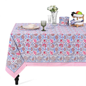 Ridhi hand block print tablecloth in pigeon blue and flamingo pink, 60x60 inches.