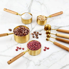 Riqwm Iro kitchen setup with gold measuring tools in use