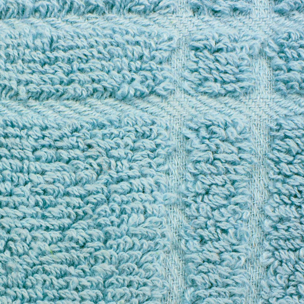 Ritz tie towel check dew draped over a refrigerator handle for easy reach