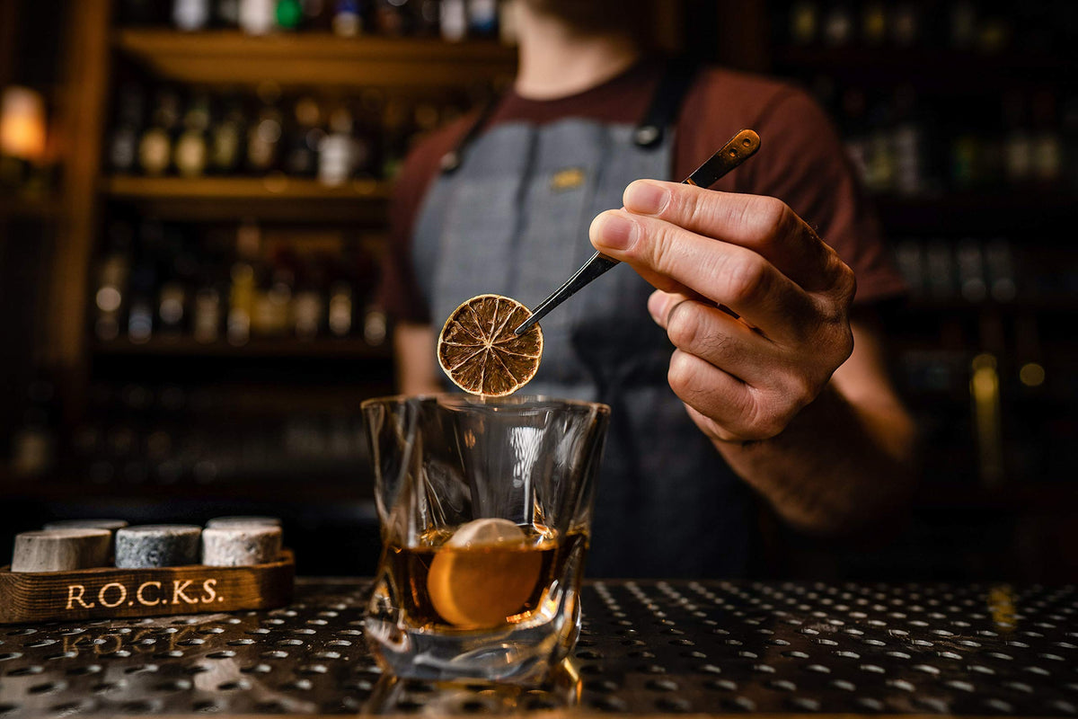 ROCKS WHISKEY CHILLING STONES on bar cart ready for gifting.