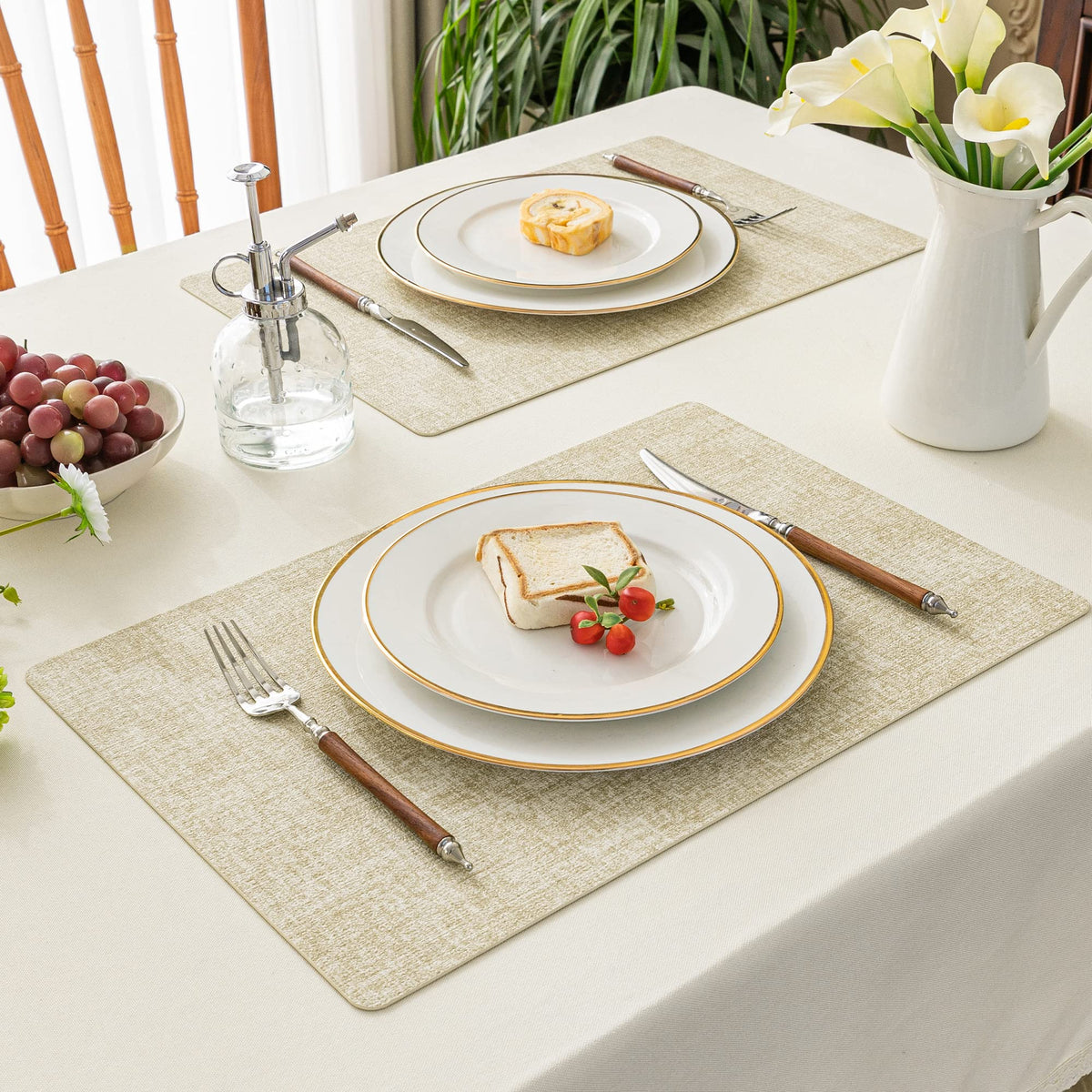 Romanstile beige placemats on stylish table decor for indoor and outdoor gatherings.