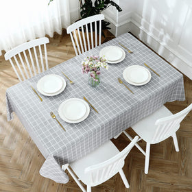 Romanstile easy-clean tablecloth in grey wipes clean quickly after spills during meals.