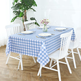Romanstile heavy-duty plastic table cover shielding furniture from heat and scratches.