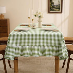 Romanstile outdoor picnic setting in sage with refined table presence.
