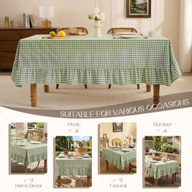 Romanstile party table setup sage showing chic ruffle detail.