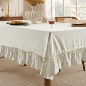 Romanstile rectangle tablecloth draped over table showing graceful drape