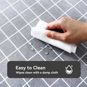Romanstile rectangle tablecloth in grey offers oil-proof protection for spills and condiments.