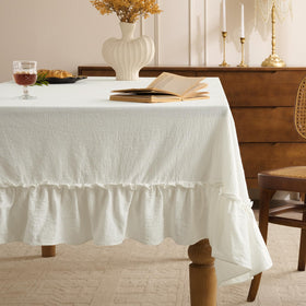 Romanstile ruffle rectangle tablecloth close-up with elegant trim for refined dining