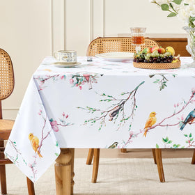 Romanstile spring rectangle tablecloth on a 54x78 inch outdoor table protecting from spills