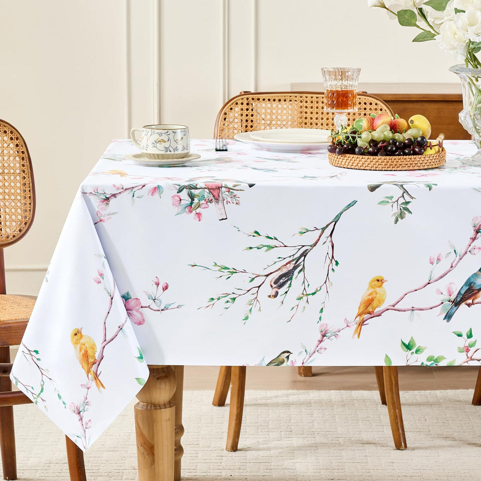 Romanstile spring rectangle tablecloth on a 54x78 inch outdoor table protecting from spills