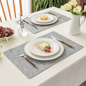 Romanstile placemats roll for storage and lay flat when used.