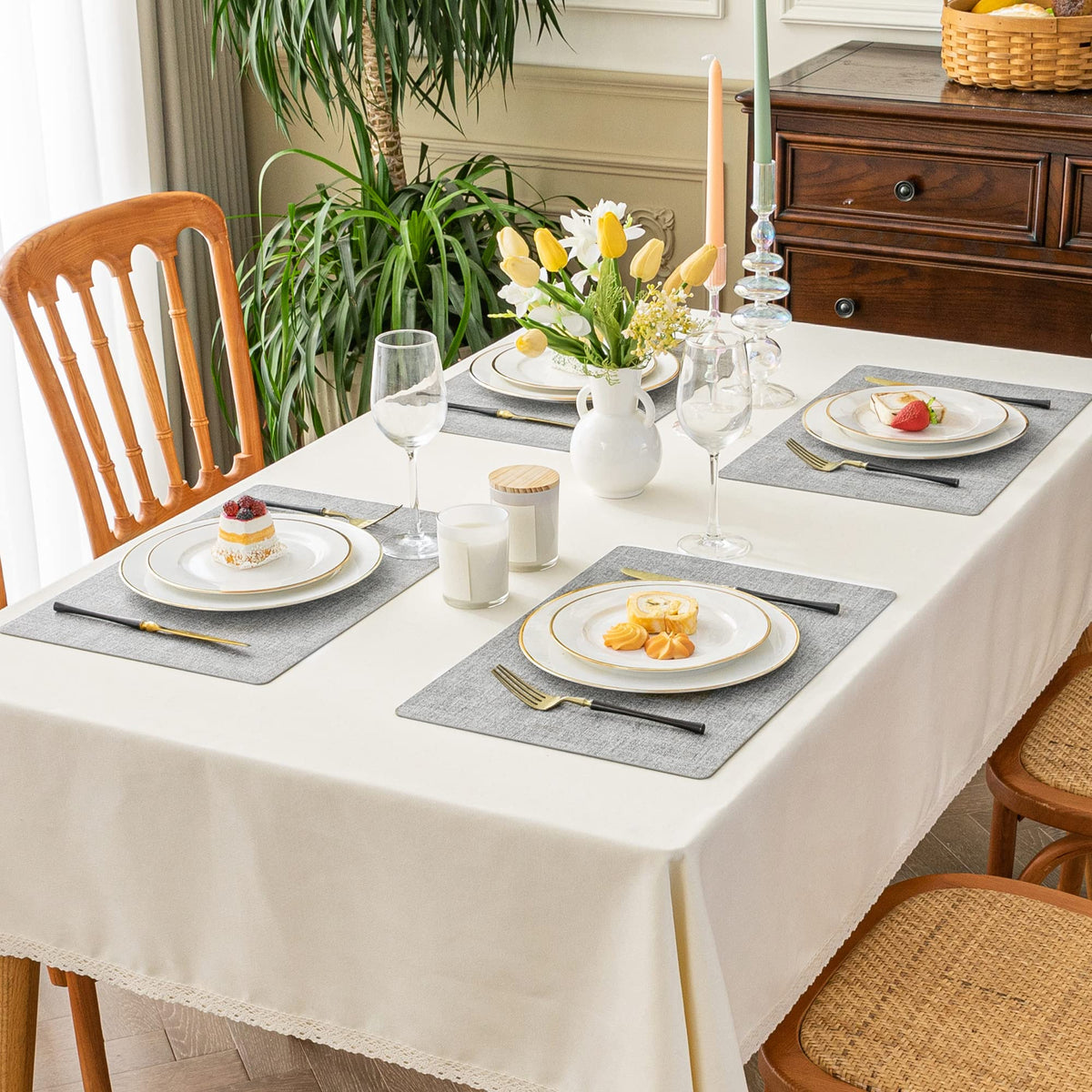 Romanstile placemats feature a durable faux leather surface.