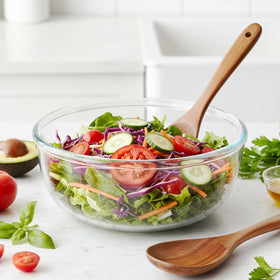 Ronanemon thick-edged glass bowl close-up emphasizes sturdy grip during mixing.