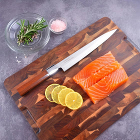Rondauno sashimi knife slicing action demonstrates smooth, controlled cuts.
