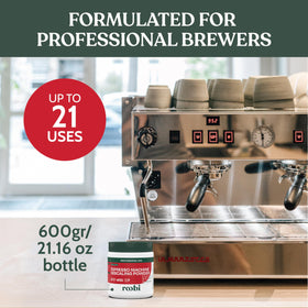 Roobi descaling powder dissolving in hot water removes mineral buildup.