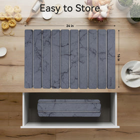 Roran Stone Drying Mat with bottles and cups drying efficiently on countertop.