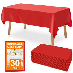 RowinsyDD red disposable tablecloth 54x108 on dining table, waterproof and stain resistant.
