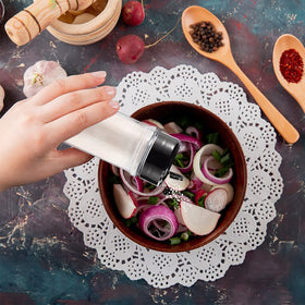 RoyalHouse spice jars shown in a pouring scenario for quick seasoning.