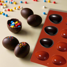 Rthjsfj molds prepared for freezing ice cubes with bright Easter appeal