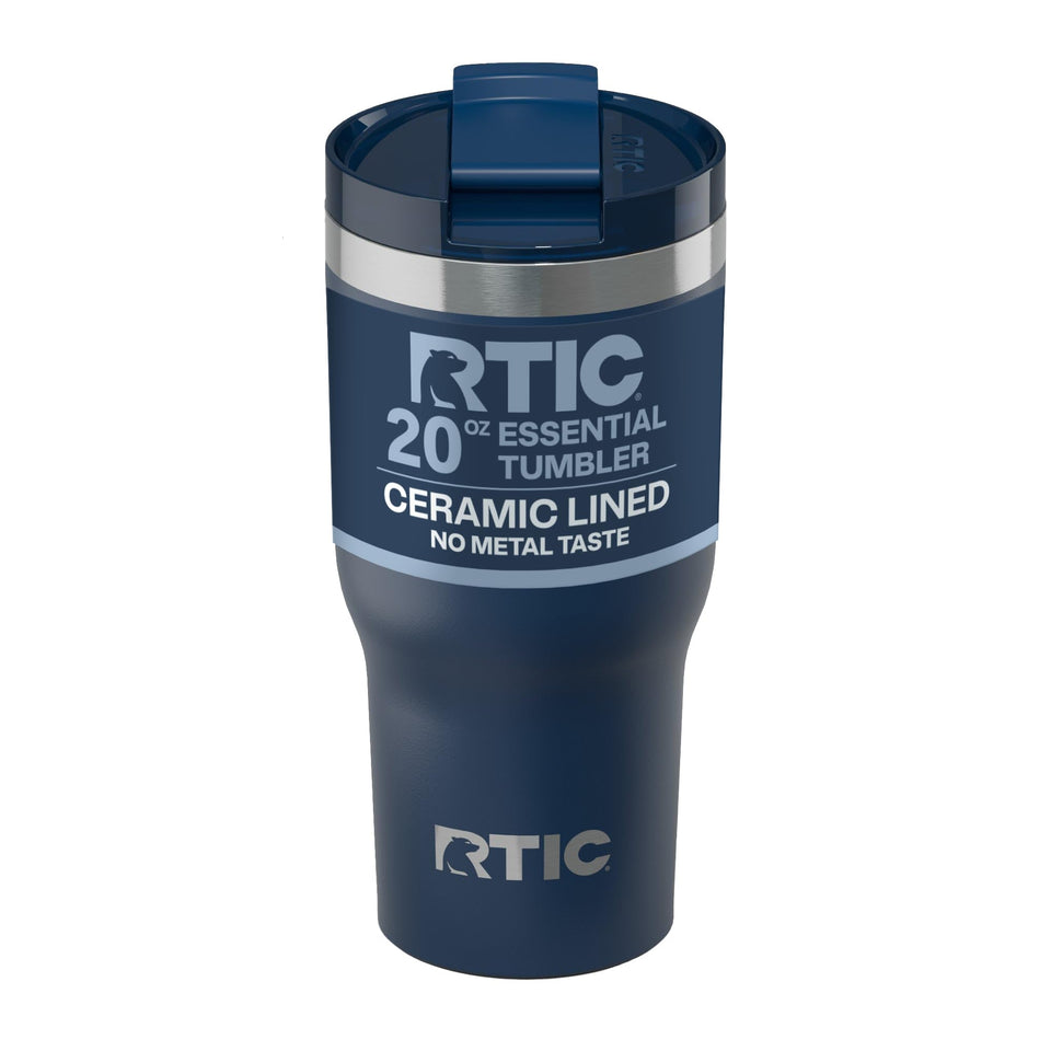 RTIC 20oz Essential Tumbler with Lid showing its lid and navy finish for travel use.