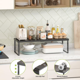 RUILALIFE heavy-duty metal shelf riser supports jars and cans securely