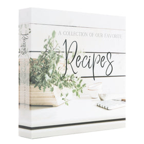 Rural Roots Mercantile recipe binder with spine-flat for easy reading.