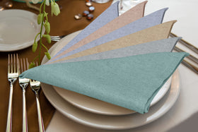 Machine-washable Ruvanti napkins demonstrated with easy care process.