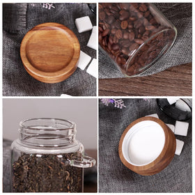 SAIOOL four-piece tea canister set with wooden lids for organized countertops.