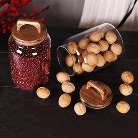 SAIOOL cereal and snacks stored in clear glass jars.