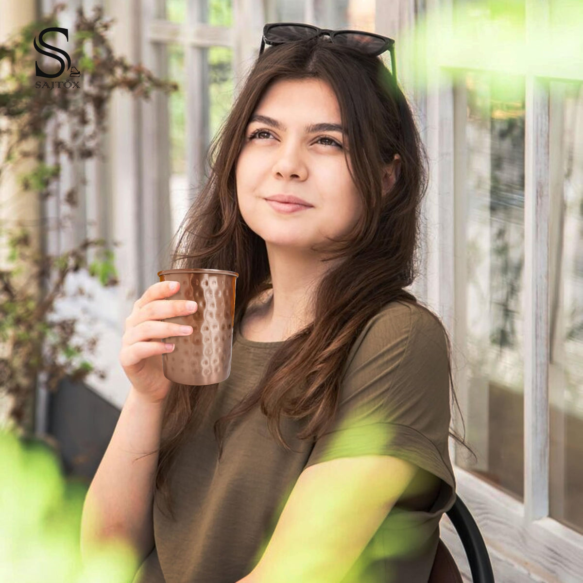 SAJTOX copper tumblers filled with water, ready for refreshing hydration.
