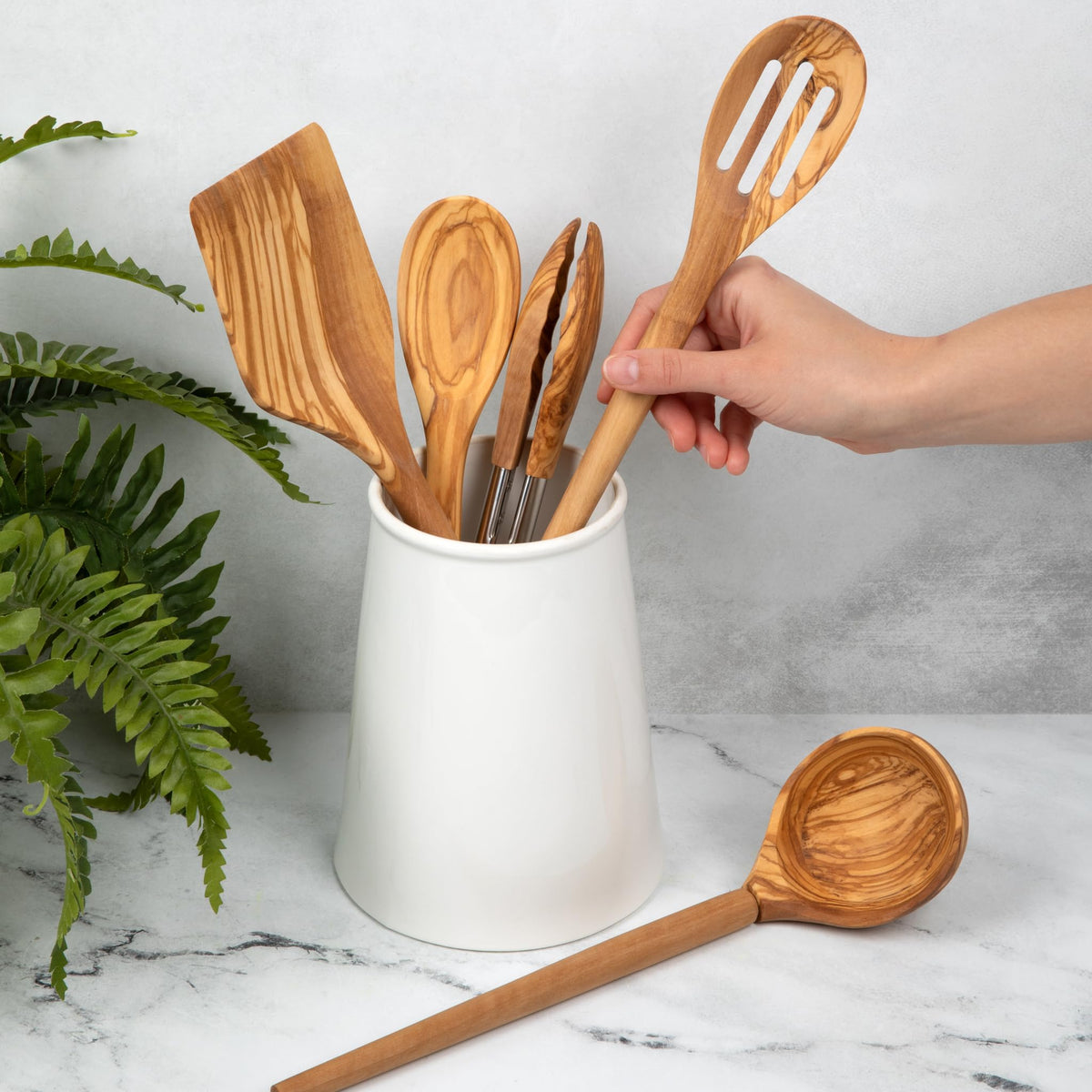 Salt & York olivewood slotted spoon drains liquids neatly while sautéing.