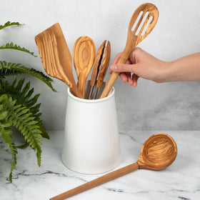 Salt & York olivewood slotted spoon drains liquids neatly while sautéing.