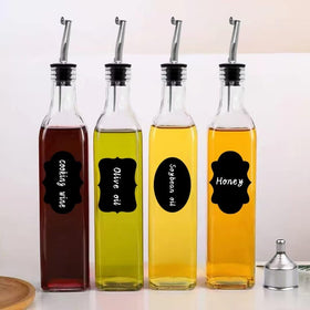 Clear glass Salzesfalls bottles simplify kitchen organization and quick identification.