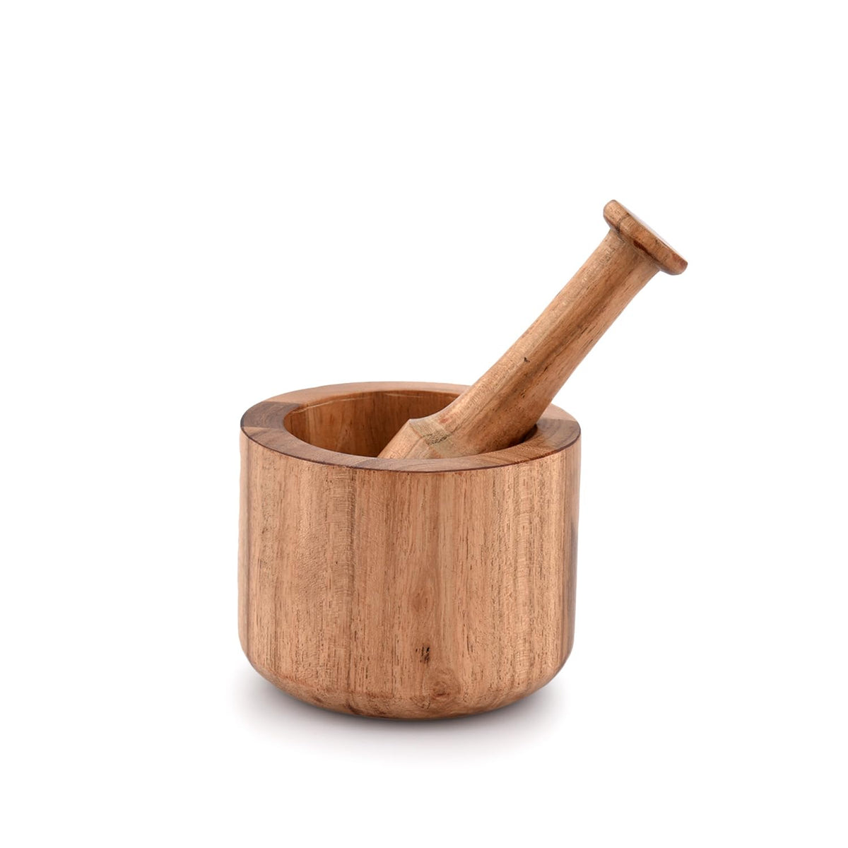 Samhita Acacia mortar and pestle on counter for quick spice grinding.