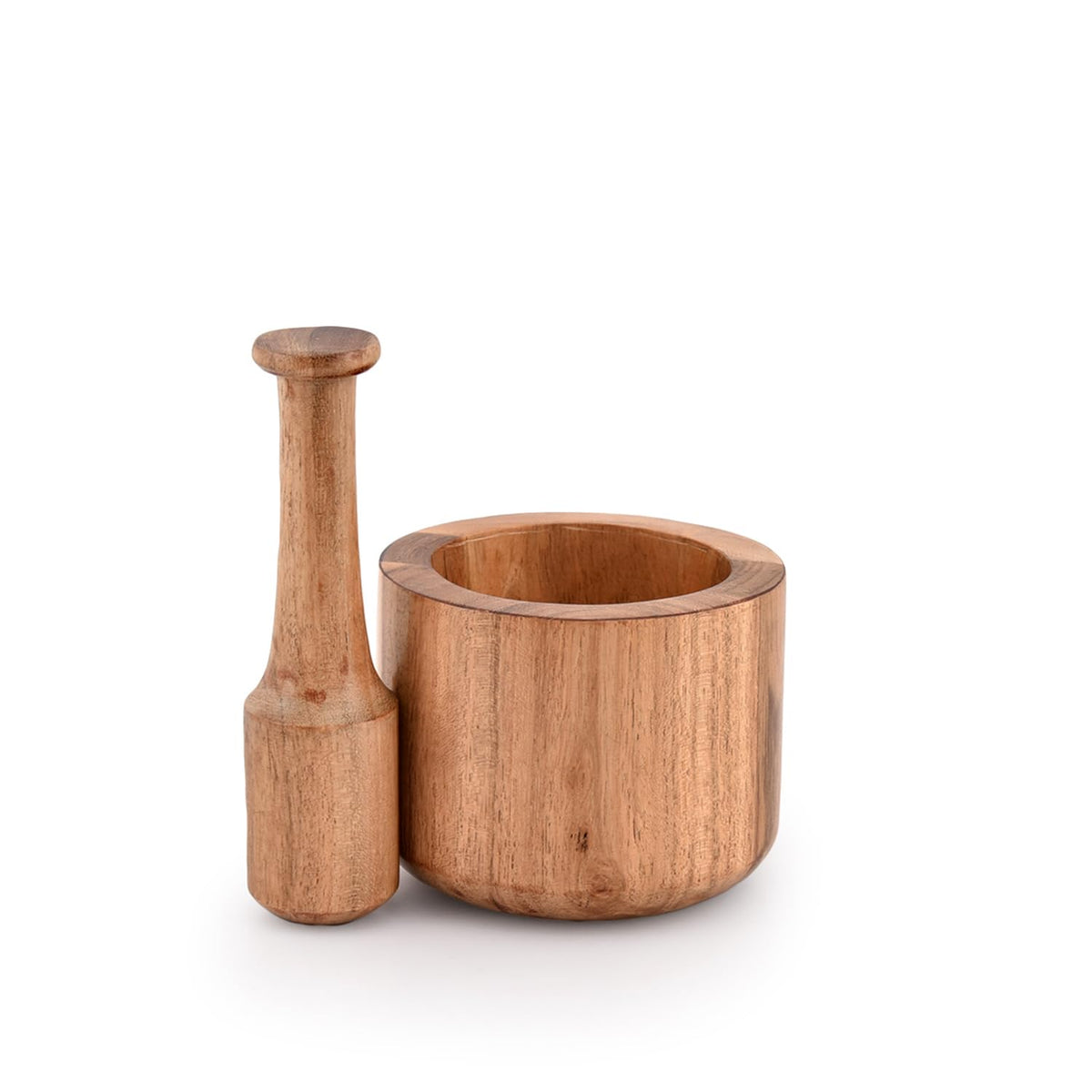 Samhita Acacia mortar and pestle crushing garlic and ginger with aroma.