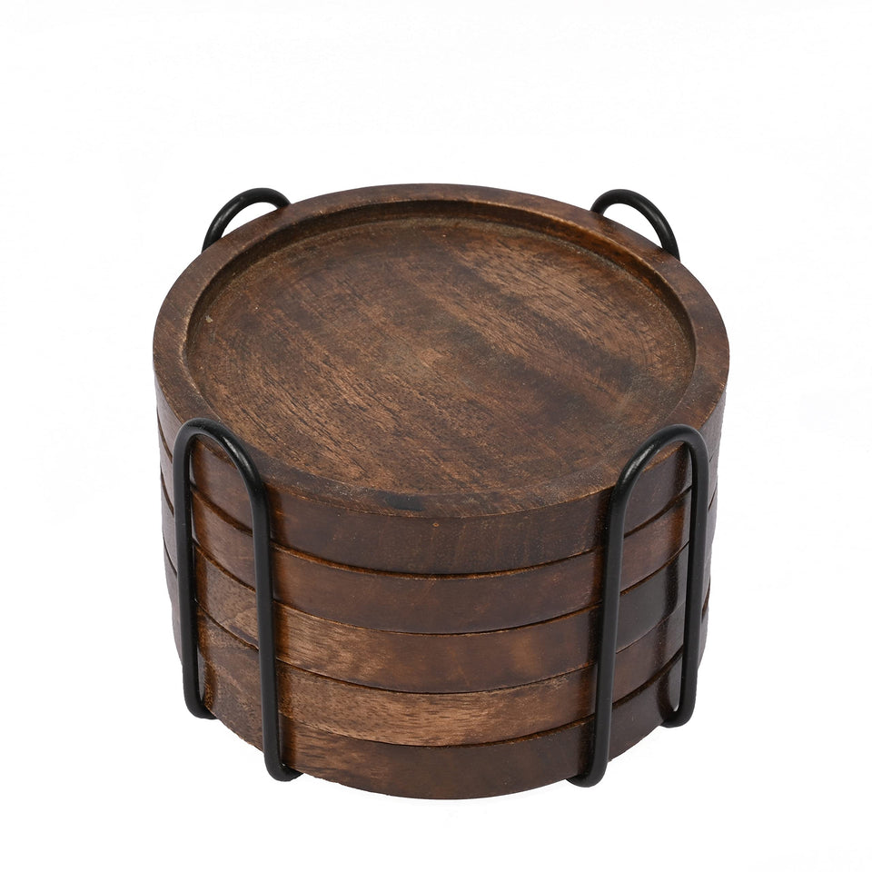 Samhita mango wood coasters on a table show natural grain and surface protection.