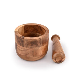 Samhita acacia wood tool enhances cooking aromas when grinding spices.